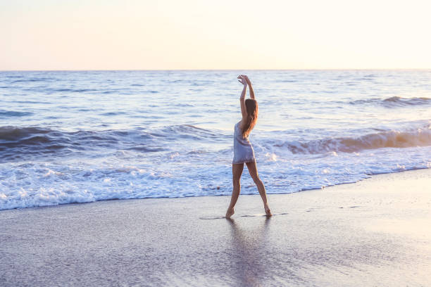 istock Young woman on the beach 1406399061