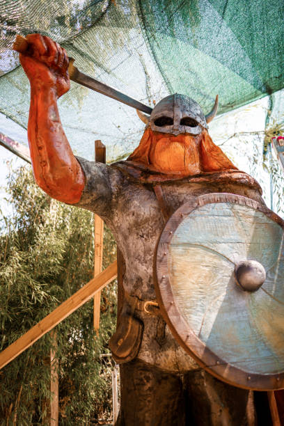 Wooden statue of Viking warrior in process