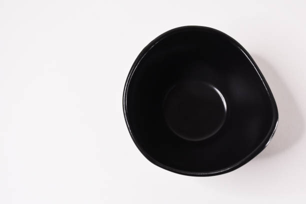 istock Black color empty bowl on the white background 1406407092