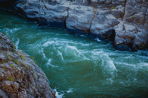 Discharge of water passing through a hydroelectric dam.
