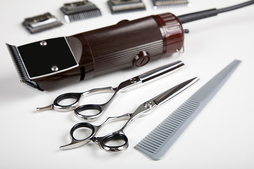 Group of professional hair cutting tools.