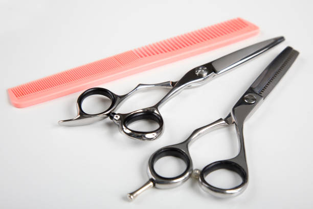 istock Hair cutting shears and pink comb 1406412814
