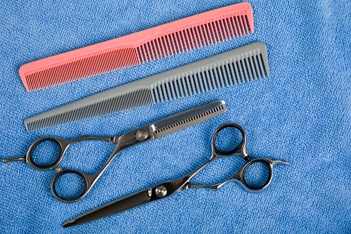Group of professional hair cutting tools.
