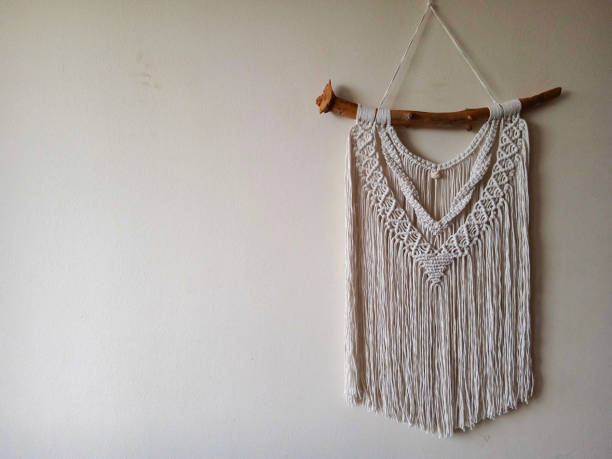 istock Macrame wall hanger, Home decor photo for interior design. Handmade wall decor 1406414151
