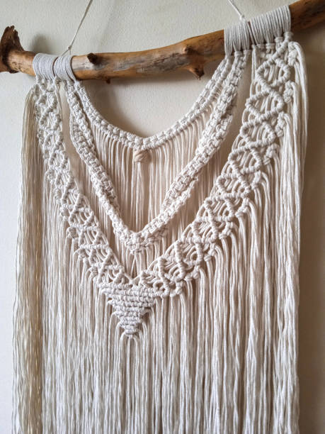 istock Macrame wall hanger, Home decor photo for interior design. Handmade wall decor 1406414170