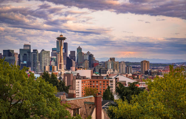 istock City skyline view with the Space Needle and Mount Rainier at sunset in Seattle 1406422285