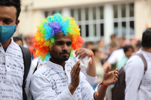 Buenos Aires, Argentina - November 09 2013. People dressed in colorful costumes at the Gay Pride Parade in Plaza de Mayo place. Participants in the annual event for the human rights protection and civil equality.