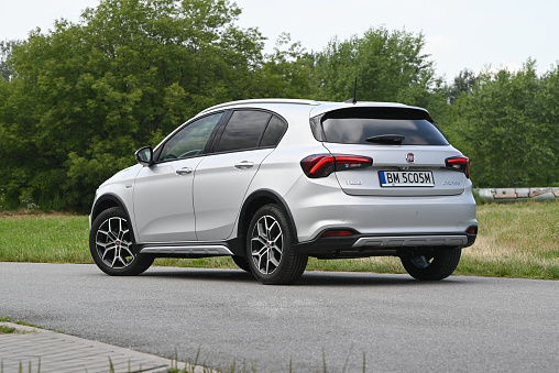 Berlin, Germany - 17th July, 2021: Fiat Tipo Cross parked on a road. This compact car is one of the cheapest vehicles in C-segment in Europe.