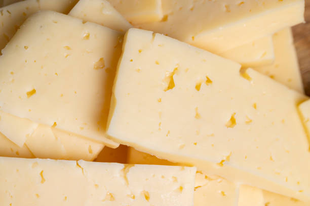 istock cut into pieces real hard cheese with lots of milk 1406422421
