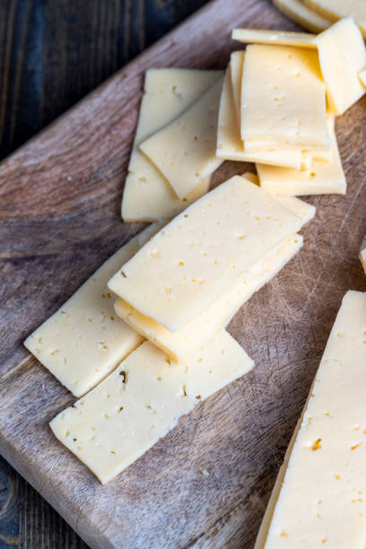istock cut into pieces real hard cheese with lots of milk 1406422426