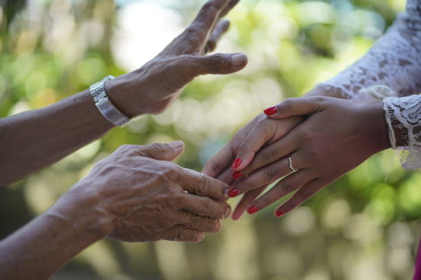 istock Two Balinese women shaking hands. 1406422557