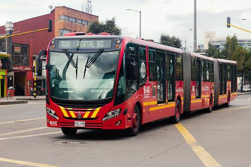 Avenida Calle 80, Bogotá Colombia, buses of the massive Transmilenio system, July 2, 2022