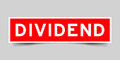 istock Sticker label with word dividend  in red color on gray background 1406432572