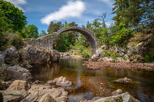 The old packhorse bridge across the River Dulnain at Carrbridge was built in 1717. One of the most iconic visitor attractions in the Cairngorms.