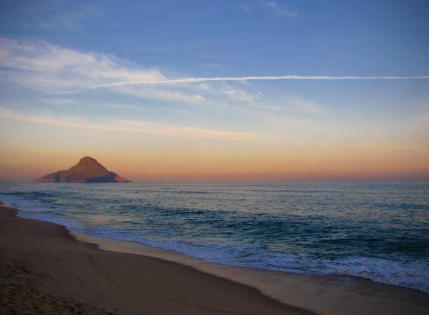 istock Sunset light at Recreio beach 1406434782