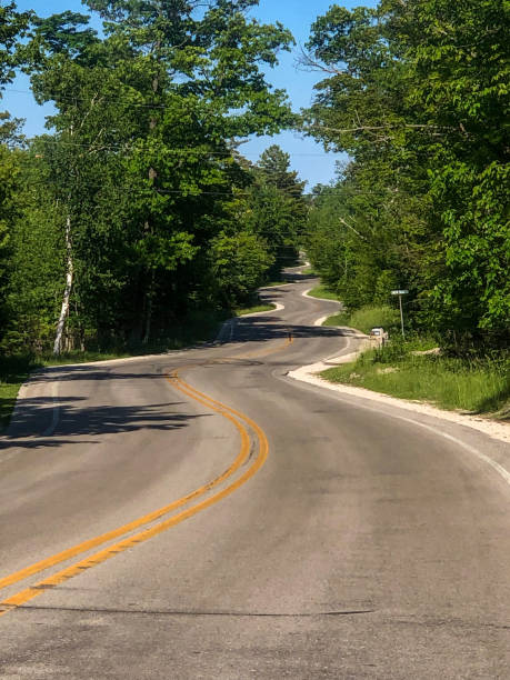 istock Unique curvy road in Door County, Wisconsin 1406439291