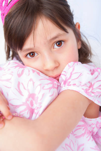 istock Sad Girl hugging self 1406441616