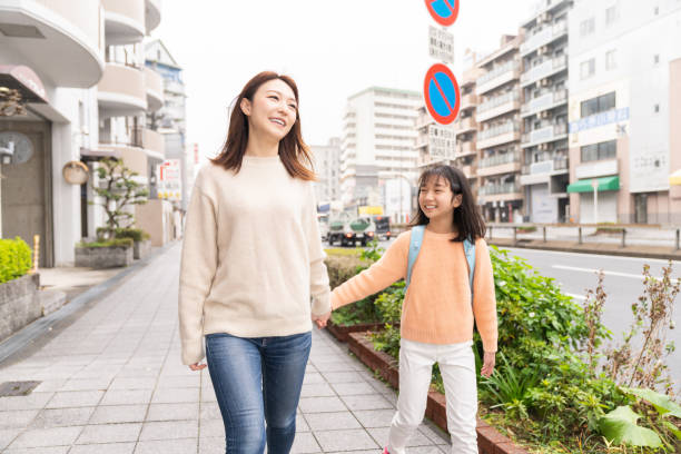 istock asian mother and daughter , School bag 1406443882