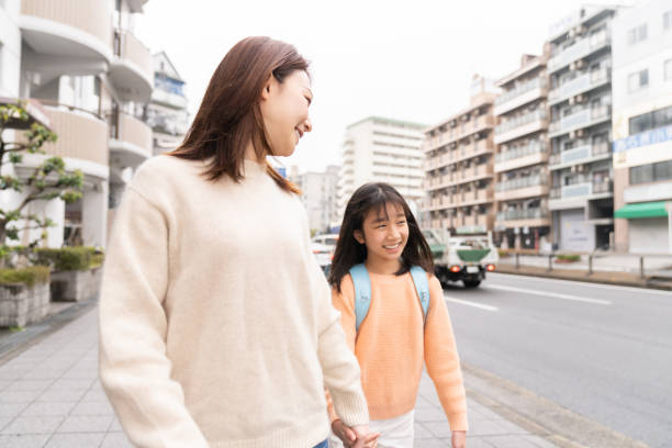 istock asian mother and daughter , School bag 1406443919