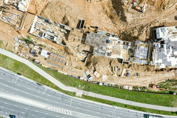 istock new construction site with crane and building materials. aerial view from above. 1406454192