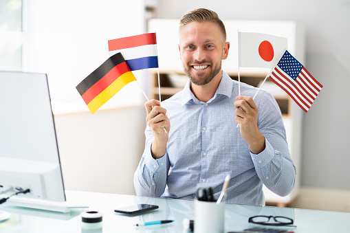 Online Foreign Language Course. Polyglot Man With Flags