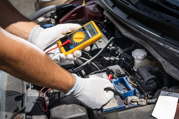 istock Car Electronic Maintenance Service And Check. Worker Man 1406458414