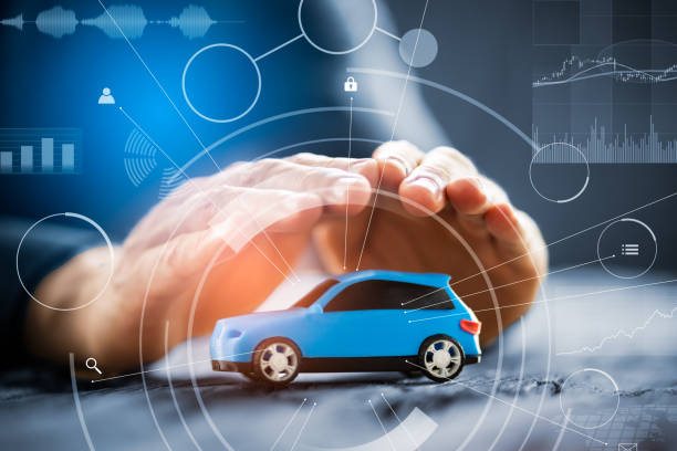 istock Businessman's Hand Protecting Blue Toy Car 1406459442