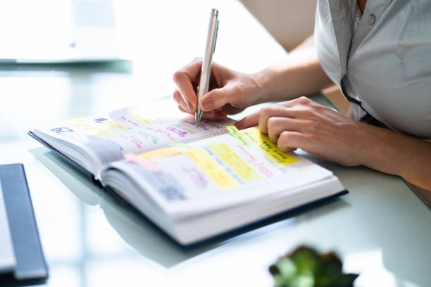 istock Looking At Calendar Schedule And Agenda 1406459705