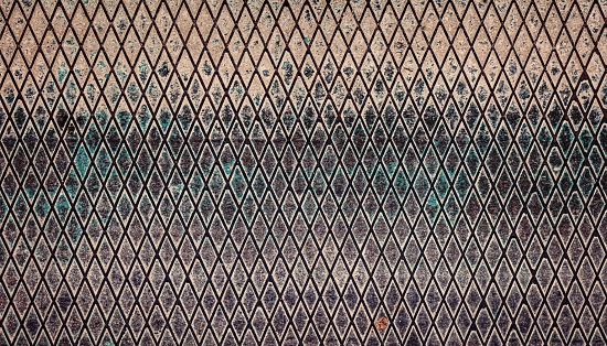 Texture of rusty old metal wall with diagonal stripes