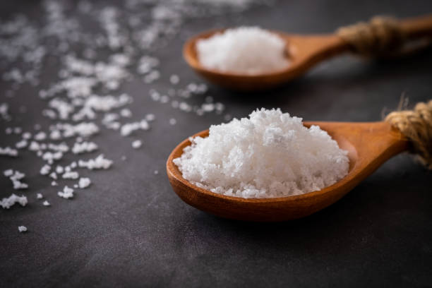 istock Salt on a wooden spoon 1406465439