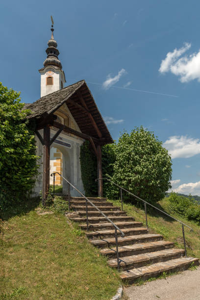 Historic Rosary or Winter Church in Maria Worth, Carinthia, Austria maria worth, austria-june, 19, 2022: Historic Rosary or Winter Church in Maria Worth, Carinthia, Austria maria woerth stock pictures, royalty-free photos & images