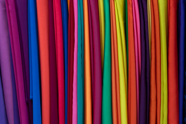 istock Colored or colorful vertical strips of fabric cloth background 1406468024