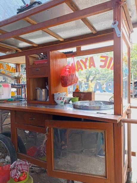 istock Gerobak mie ayam or chicken noodle cart on road side. 1406469251