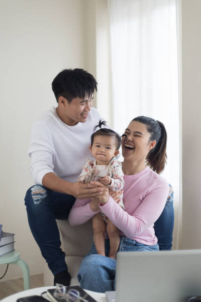 istock Wealthy Family Laughing Together 1406469293