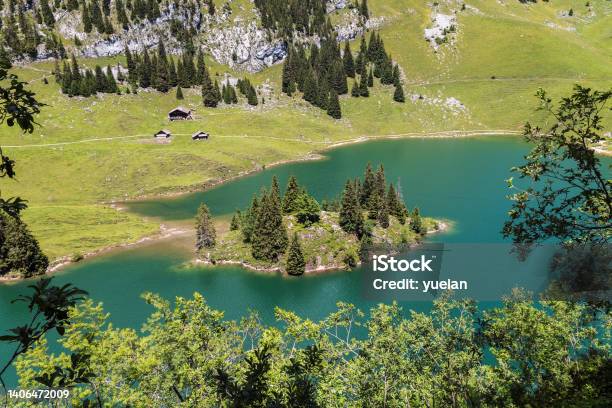 The Turquoise Lake Hinterstocken With The Islet At The Foot Of Stockhorn Stock Photo - Download Image Now