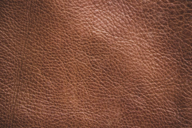 istock Genuine leather texture background. Dark brown, orange textures for decoration blank. Vintage skin natural suede with design line pattern or red abstract can use wallpaper or backdrop luxury event. 1406474999