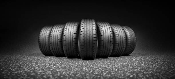 istock Car Tires on asphalt road 1406475243