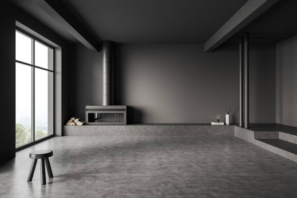 istock Grey empty room, studio apartment and fireplace, window and stool on dark floor 1406475434
