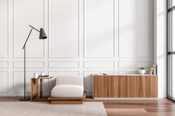istock Light chill room interior with seat and wooden drawer near window. Empty wall. 1406476093