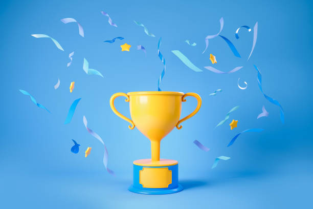istock Gold cup with falling confetti on blue background, winner trophy 1406476163