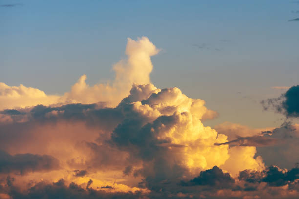 istock Beautiful stormy cumulus clouds in the sky, background. 1406476168