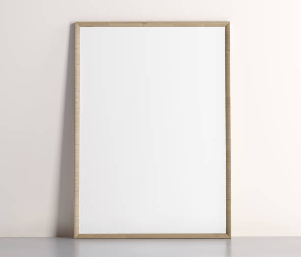 istock Wood  frame with passepartout on the wall with long soft shadow 1406476574