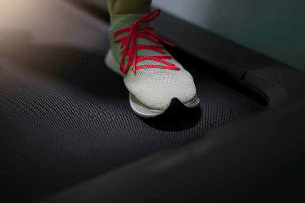 istock run shoe on treadmill for sport gym 1406478254