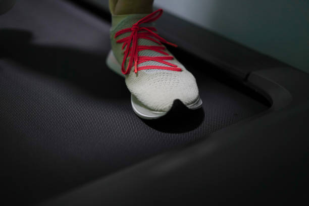 istock run shoe on treadmill for sport gym 1406478285
