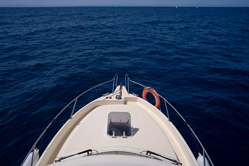 Yacht boat sailing in the blue sea in summer blue sky vacations paradise concept