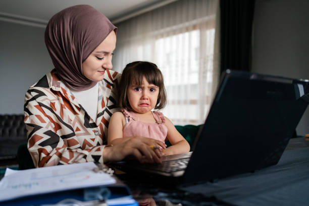istock Middle Eastern Mother working from home with kid 1406481258