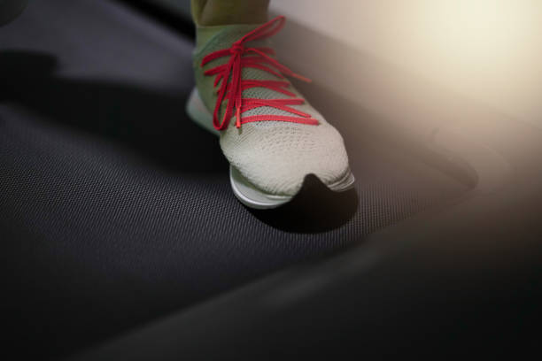istock run shoe on treadmill for sport gym 1406481534