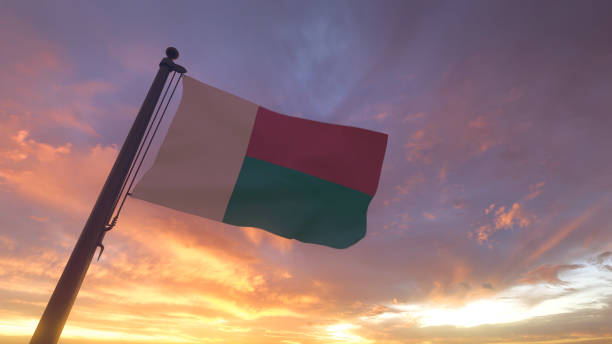 istock Madagascar Flag on Flagpole by Evening Sunset Sky 1406483141