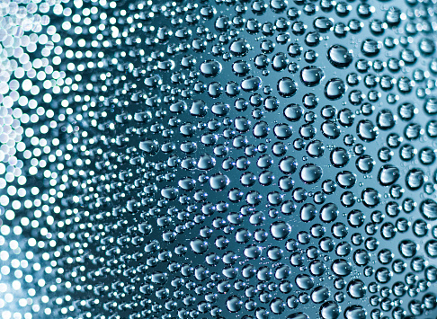Small droplets of water condensation on plastic surface