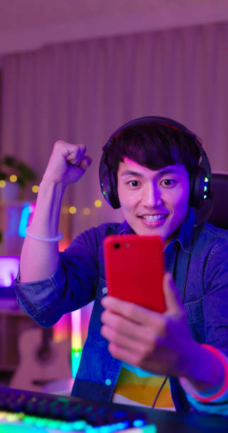 istock esport gamer plays mobile game 1406488710